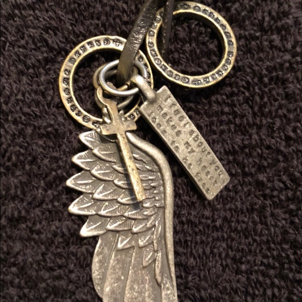 Unisex Feather + add’l charms on leather cord